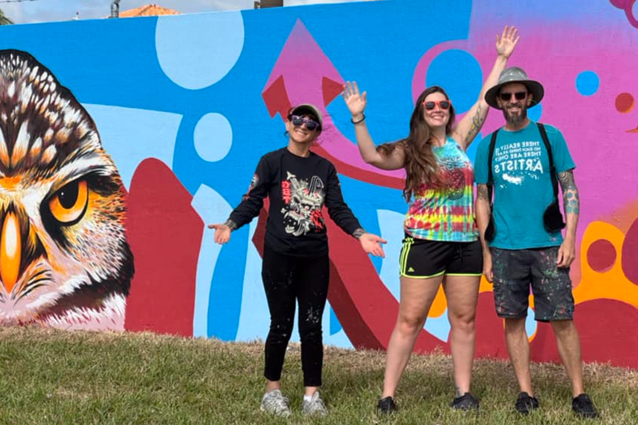 FAU Student Involved in Painting Airport Mural